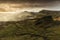 Scenic view of Quiraing mountains in Isle of Skye, Scottish highlands, United Kingdom. Sunrise time with colourful an rayini