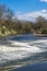 Scenic View of The River Aire at Shipley Looking Downstream from a Weir.