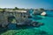 Scenic view of the rocky cliffs of St. Andrew on the coast of Salento, in Apulia Italy.