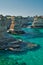 Scenic view of the rocky cliffs of St. Andrew on the coast of Salento, in Apulia Italy.