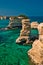 Scenic view of the rocky cliffs of St. Andrew on the coast of Salento, in Apulia Italy.