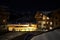 Scenic view of a rustic cabin resort near mountains under a starry night sky in Montgenevre, France