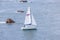 A scenic view of a sailboat along the Scottish coast on May 17, 2022 in Findochty, Moray, Scotland