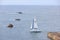 A scenic view of a sailboat along the Scottish coast on May 17, 2022 in Findochty, Moray, Scotland