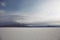 Scenic View Of Salar De Uyuni Against Clouded Sky