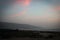 Scenic view of sand coast of Dead Sea by sunset, Jordan