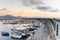 Scenic view of the sea and boats in the port at sunset, on background Sorrento peninsula in Torre del Greco near Naples