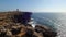 Scenic view of the sea and coastline rocks with Cabo Carvoeiro lighthouse in Peniche, Portugal