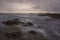 Scenic view of sea waves in Northern Portuguese beach at sunset, long exposure