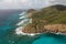 Scenic view of the serene, blue ocean waters and rocky shorelines from Rendezvous Beach, Antigua