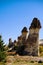 Scenic view of shaped sandstone rocks. Famous Fairy Chimneys or Multihead stone mushrooms in Pasaba Valley near Goreme