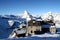 Scenic view on snowy Matterhorn peak in sunny day with blue sky and some clouds in background