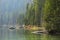 A scenic view of String Lake with pine trees in Grand Teton National Park, Wyoming.