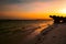 Scenic view of sunset at Watamu Beach seen through a hole on a coral rock in Watamu, Kilifi County, Kenya