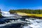 Scenic view of Tannforsen waterfall in Sweden on a sunny day