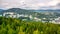 Scenic view of Tanvald and spruce forests of hilly landscape around Tanvaldsky Spicak mountain, Jizera Mountains, Czech