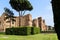 Scenic view of Terme di Caracalla in Rome. Umbrella pines in vast around ruins