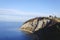 Scenic view to beautiful green hills with blue Adriatic sea against blue sky in spring from Slovenian coast.