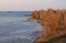 Scenic view to river shoreline illuminated by sunset. Dnieper river near Cherkasy, Ukraine