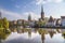 Scenic view to skyline of Luebeck at river Trave