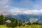 Scenic view from the top of the mountains to the valley covered with fog near the town Colfosco Calfosch