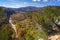 A scenic view of trees changing color and the Buffalo River in the Ozark Mountains