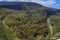 A scenic view of trees changing color and the Buffalo River in the Ozark Mountains