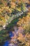 A scenic view of trees changing color and the Buffalo River in the Ozark Mountains