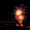 Scenic view of vibrant fireworks in the sky at night