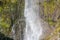 A scenic view of the waterfall in New Zealand