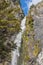 A scenic view of the waterfall in New Zealand