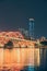 Scenic view of Wenhui Bridge with its bright night illumination. Liuzhou, China.