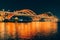 Scenic view of Wenhui Bridge with its bright night illumination. Liuzhou, China.