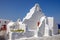 Scenic view of whitewashed church Panagia Paraportiani, Mykonos, Greece