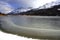 Scenic view of winter snow mountains landscape and frozen lake in the swiss Alps in Engadin