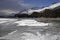 Scenic view of winter snow mountains landscape and frozen lake in the swiss Alps in Engadin