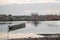 Scenic view of a wooden canoe moored in a river at a cloudy sunset in Madagascar