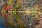 Scenic view of Yunoko lake at fall with colorful trees at sunset