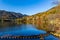 Scenic view of Yunoko lake at fall with colorful trees at sunset