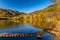 Scenic view of Yunoko lake at fall with colorful trees at sunset