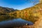 Scenic view of Yunoko lake at fall with colorful trees at sunset