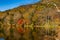 Scenic view of Yunoko lake at fall with colorful trees at sunset