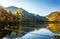 Scenic view of Yunoko lake at fall with colorful trees at sunset