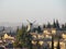 Scenic views of Jerusalem`s neighborhoods and the windmill at dawn.