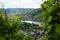 scenic vineyard on by the Moselle river and panoramic view of German village Alken (Germany)