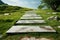 Scenic walkway on vibrant green grass, creating a peaceful atmosphere