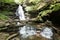 Scenic Waterfall in Ricketts Glen State Park in The Poconos in P