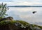 Scenic waterscape with a rocky shore during daytime