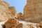 Scenic weathered orange rocks in stone desert