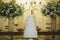 Scenic wedding cake with table bottom decorated with Brazilian flowers and sweets